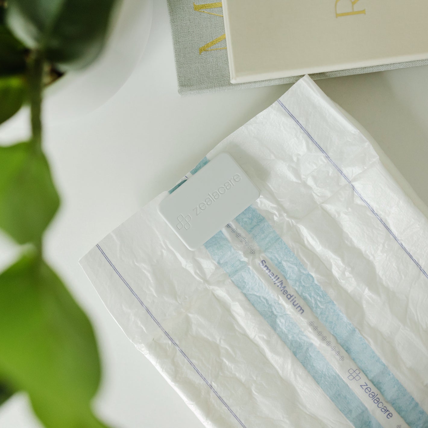 Smart incontinence adult diaper with sensor that has wetness sensing capabilities.